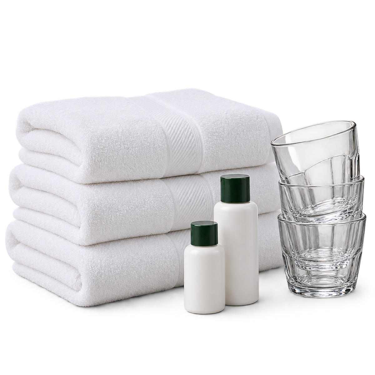 White hospitality towels, unlabelled amenity bottles and glasses